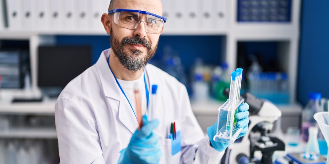Middle-aged man conducting lab tests