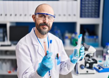 Middle-aged man conducting lab tests