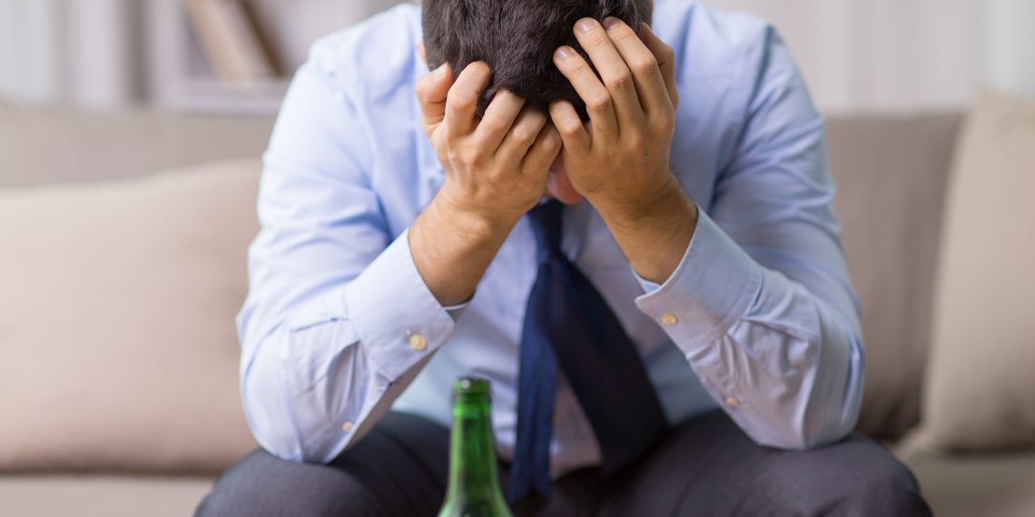 Middle-aged Man, Alone, Drinking