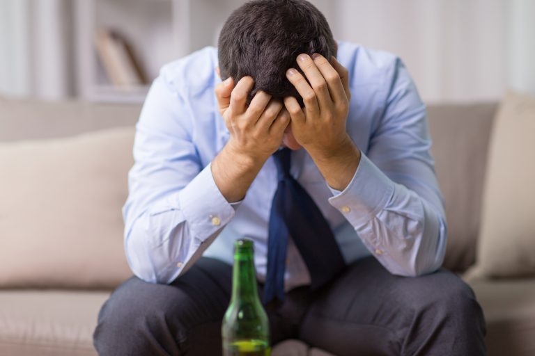 Middle-aged Man, Alone, Drinking